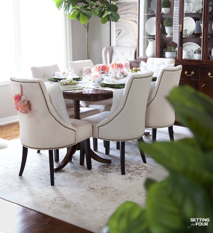 Easter table decorations. DIY floral wreath to hang on the chairs.