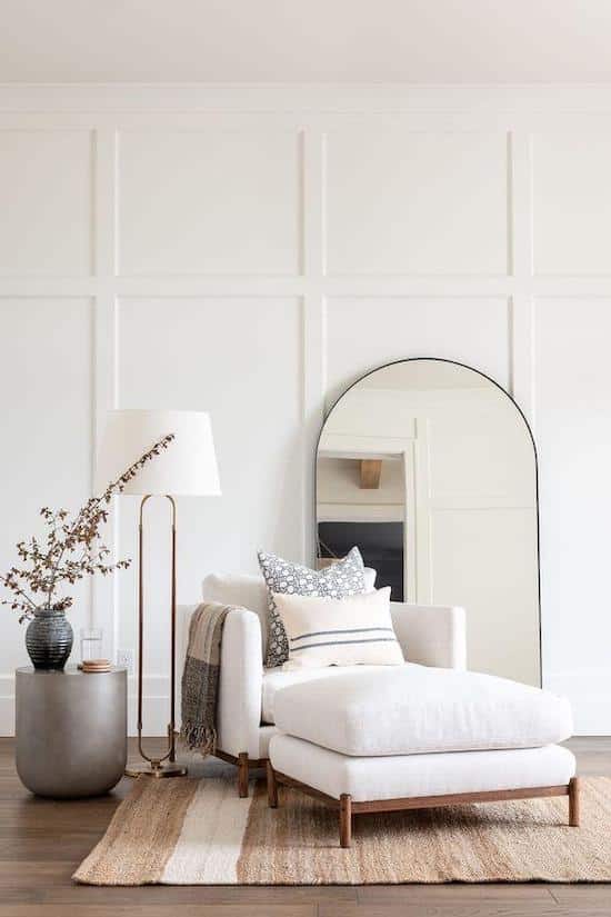 Living Room Decor Ideas With Mirrors and cozy living room inspiration, neutral accent chair, black arch mirror, wall decor ideas, wall mirror, floor mirror and floor lamp, fits with modern farmhouse, transitional, Scandinavian style, board and batten molding, white wall color