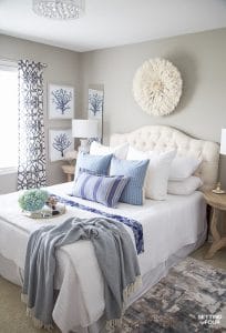 Lighten and brighten your bedroom for summer with these 7 simple summer bedroom decorating ideas! Read my design tips on selecting summery color palettes, bedding, fabric patterns and art! #decor #decoratingideas #decorating #summer #bedroom