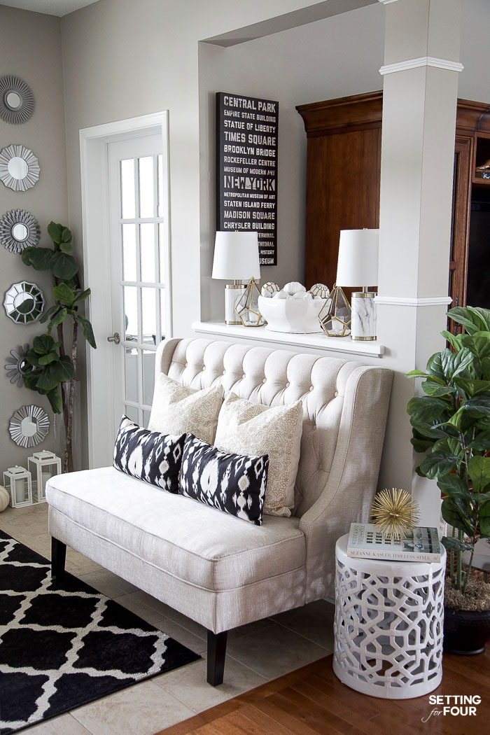 Gorgeous accent mirror gallery wall in an entryway.