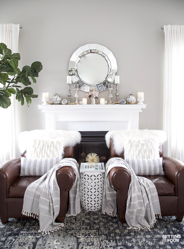 Elegant, Neutral Fall Mantel Decor Ideas with glam pumpkins & pinecones #fall #autumn #fireplace #mantel #decor #decorations #pumpkin #pinecones #leaves #candles #livingroom