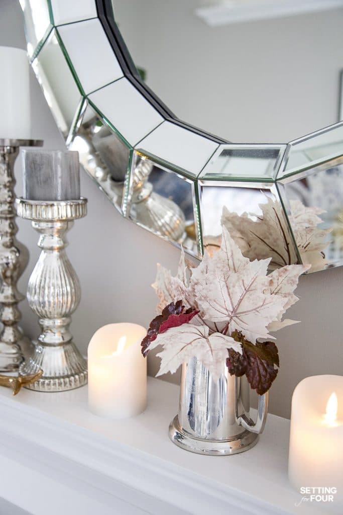 Rustic glam mantel decor ideas for fall! #fall #autumn #fireplace #mantel #decor #decorations #pumpkin #pinecones #leaves #candles #livingroom