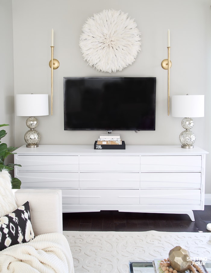 What to Hang Over a TV! #lamps #gray #juju #whitedecor #walldecor #tv #tvwall #gallerywall #diy #repurpose #dresser #gold #whitedecor #arearug