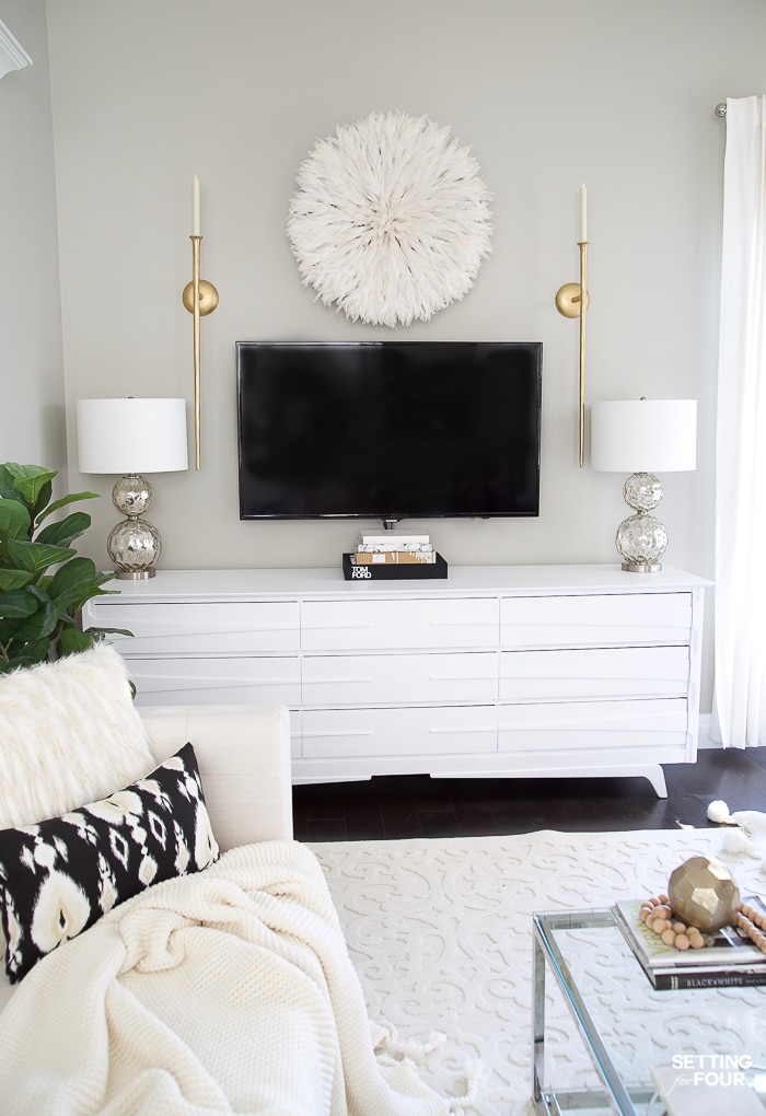 TV Wall Decor Idea - Decorate With A Juju Hat! #decor #paintcolor #gray #juju #hat #walldecor #tv #tvwall #gallerywall #diy #tvunit #dresser #wallsconce 