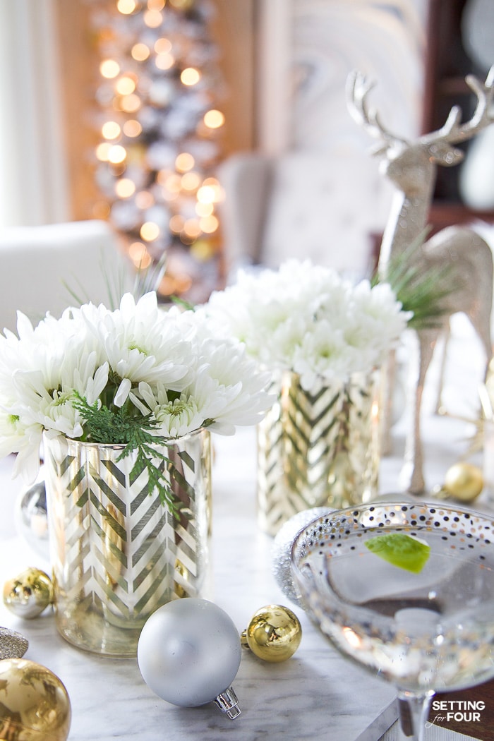 See my Styled and Set Christmas Table Decor Ideas - tips on seating, centerpiece ideas, place setting ideas, festive decor and more! #christmasgreenery #christmasflowers #christmascenterpiece #christmasarrangement #centerpiecedecor #christmasdeer 