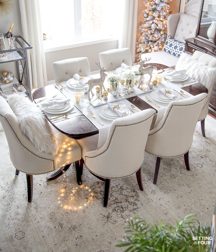 See my Styled and Set Christmas Table Decor Ideas - tips on seating, centerpiece ideas, place setting ideas, festive decor and more! #diningroom #diningchairs #xmasdecorations #holidaydecorations