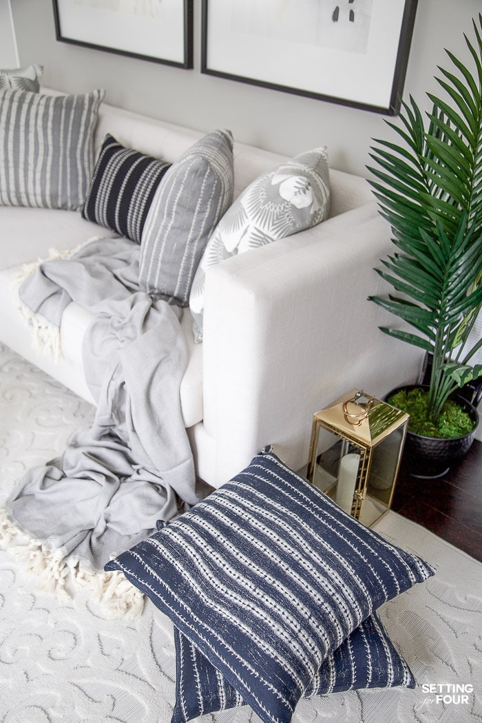 Living Room Makeover and design ideas - New TV Stand, Wall Art, Rug & Pillows! #pillows #pillowcovers #pillowtalk #throwpillows #throw #blanket #lanterns #lighting