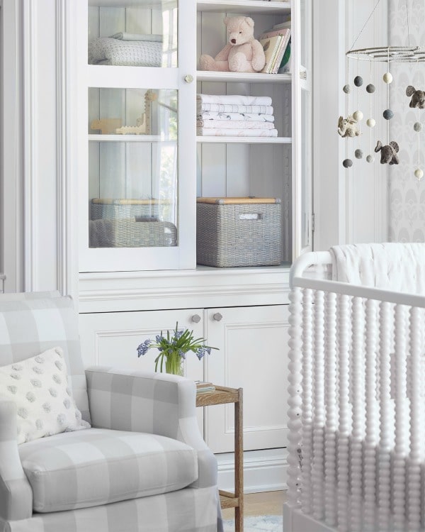 Sophisticated neutral baby room. #baby #room #traditional #crib #decorstyle #storage #mobile