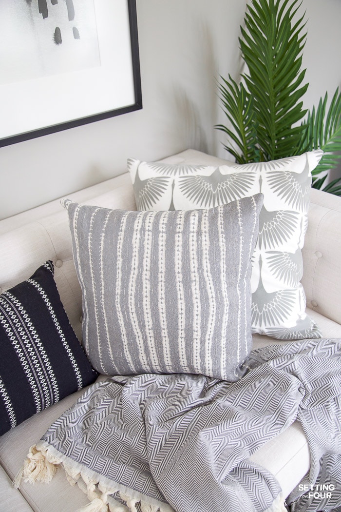 Living Room Makeover and design ideas - New TV Stand, Wall Art, Rug & Pillows! #pillows #pillowcovers #pillowtalk #throwpillows #throw #blanket #lanterns #lighting