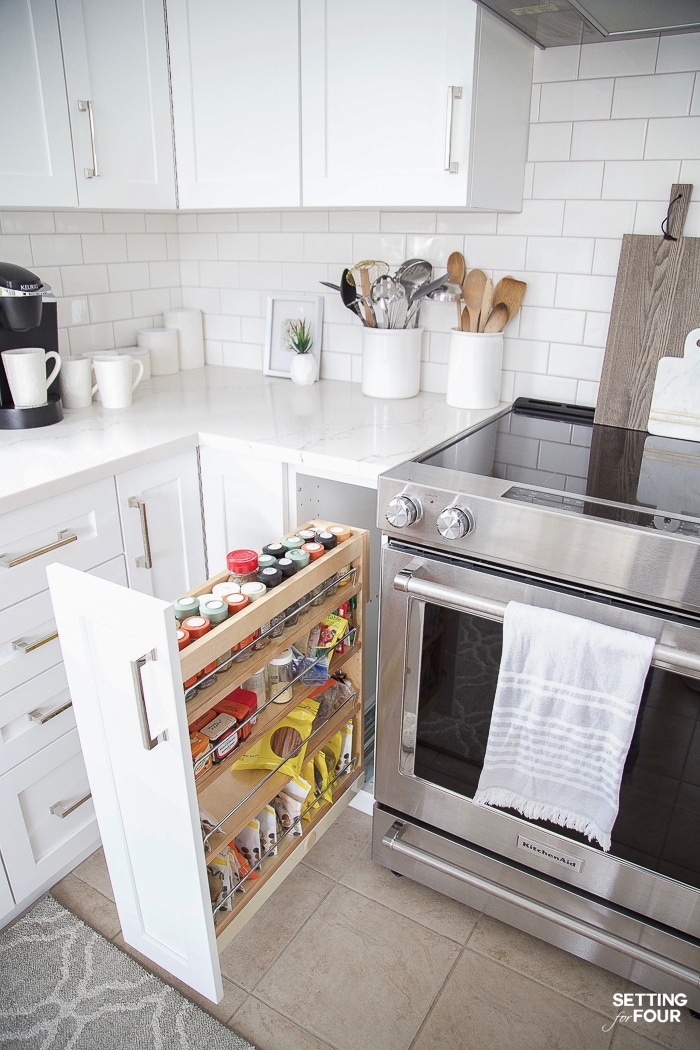 Kitchen cabinet organization ideas. Roll out spice rack in lower cabinet. #kitchen #organization #spicerack #remodel #renovation #homeimprovement