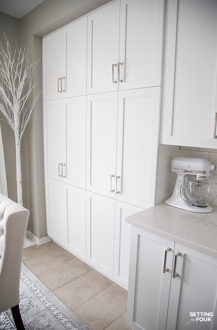 White shaker kitchen cabinet doors after the makeover. We refaced dark wood kitchen cabinets. #pvc #cabinets #wood #dark #door #style #makeover #ideas