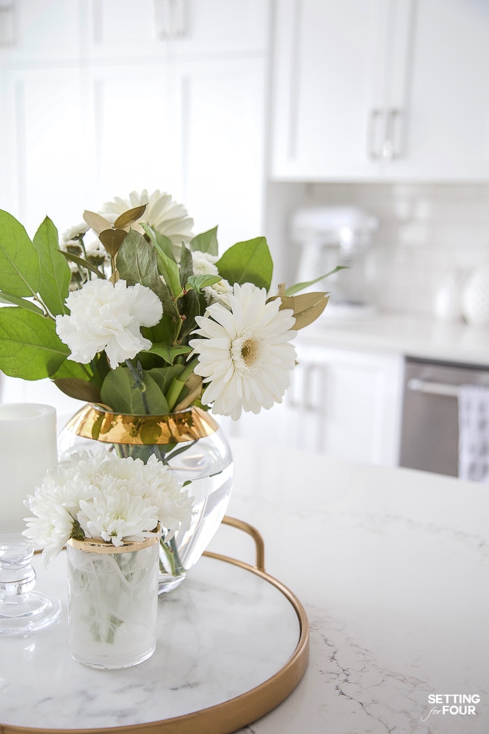 Simple kitchen island decor idea. Centerpiece with gold tray and flowers. #kitchen #island #decor #decorideas #glam #modern 