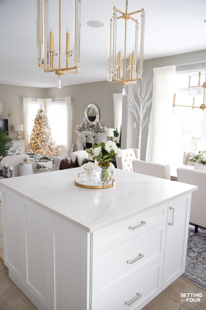 Caesarstone stautario nuvo quartz countertop on kitchen island. Looks like a natural marble but doesn't stain or etch. #stainresistant #heatresistant #quartz #countertop #material #white #gray #veining