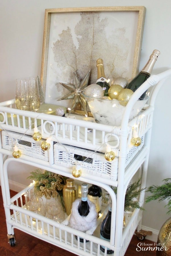 Vintage wicker bar cart for New Year's Eve party #stringlights #barcart #newyearseve #decor