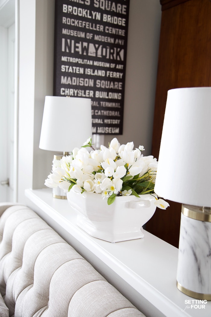 Spring flower arrangement with tulips and cherry blossoms. #decor #spring #tulips #flowers #display #shelf #styling