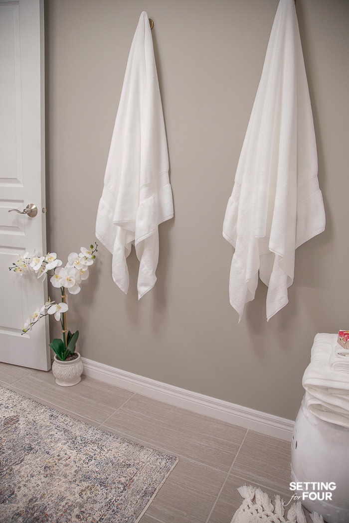 Hang towels on hooks. Bathroom decor and storage idea! #bathroom #organization #storage #hooks #towels