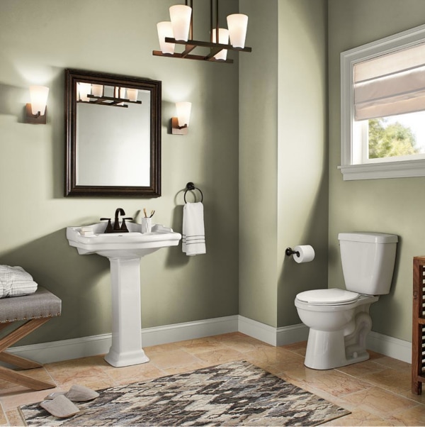 A beautiful bathroom with walls painted Back To Nature by Behr. 