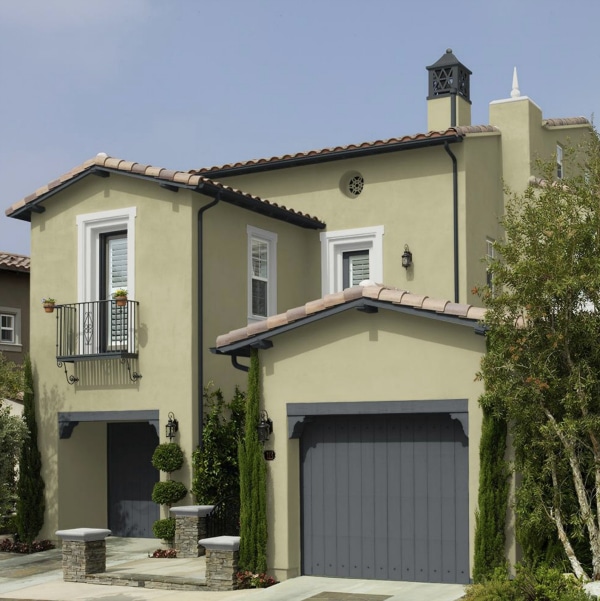 See this beautiful home exterior with stucco painted Back To Nature by Behr. Color of the Year 2020.