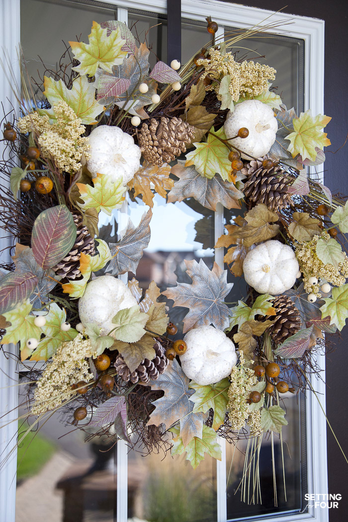 Neutral Fall Porch Wreath to decorate your front door with white pumpkins and fall leaves.