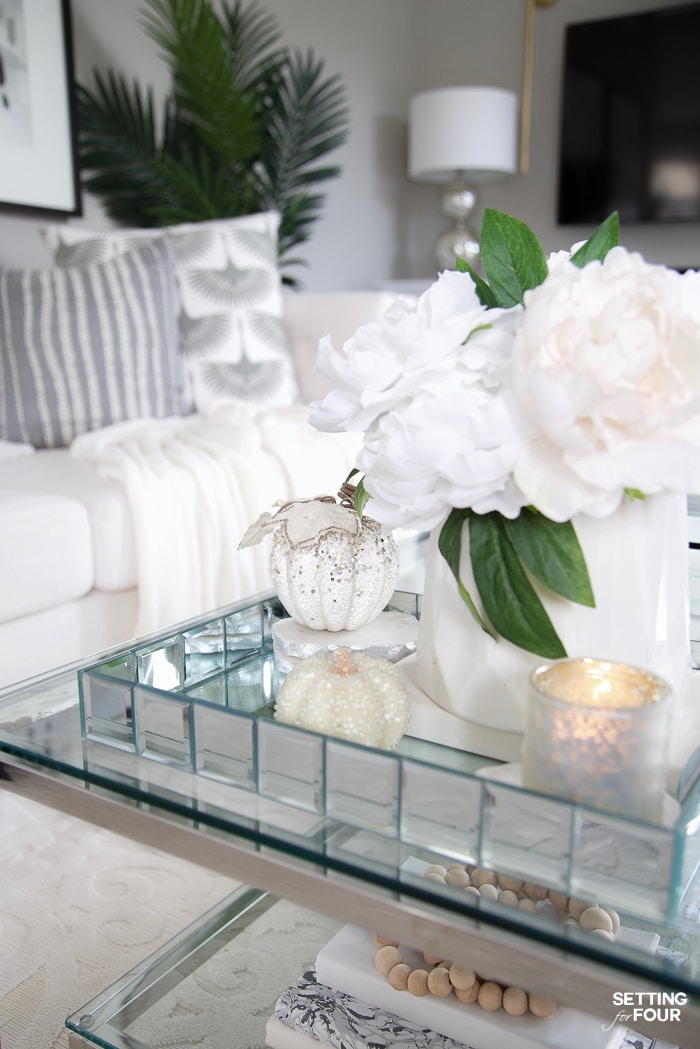 Elegant Fall Living Room Decor Ideas with white sparkle pumpkins.