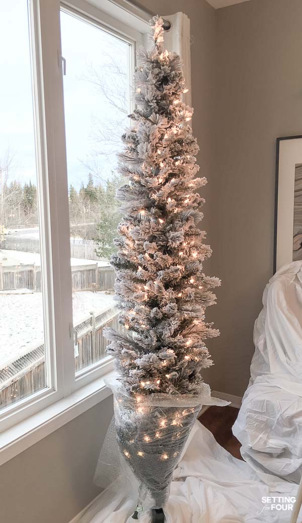 How to put up a flocked Christmas tree without the mess!