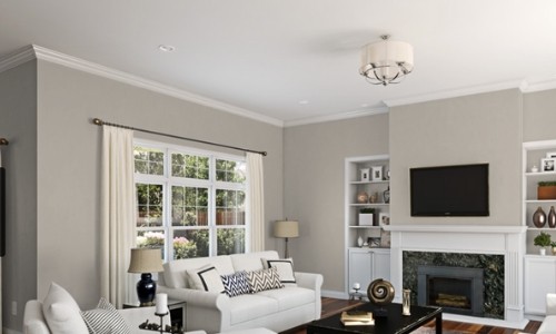 Living room painted Sherwin Williams Agreeable Gray! It's one of the most popular TOP 50 paint colors at Sherwin Williams.