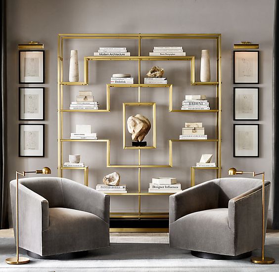 Living room armchair furniture arrangement idea with bookcase as a focal point.