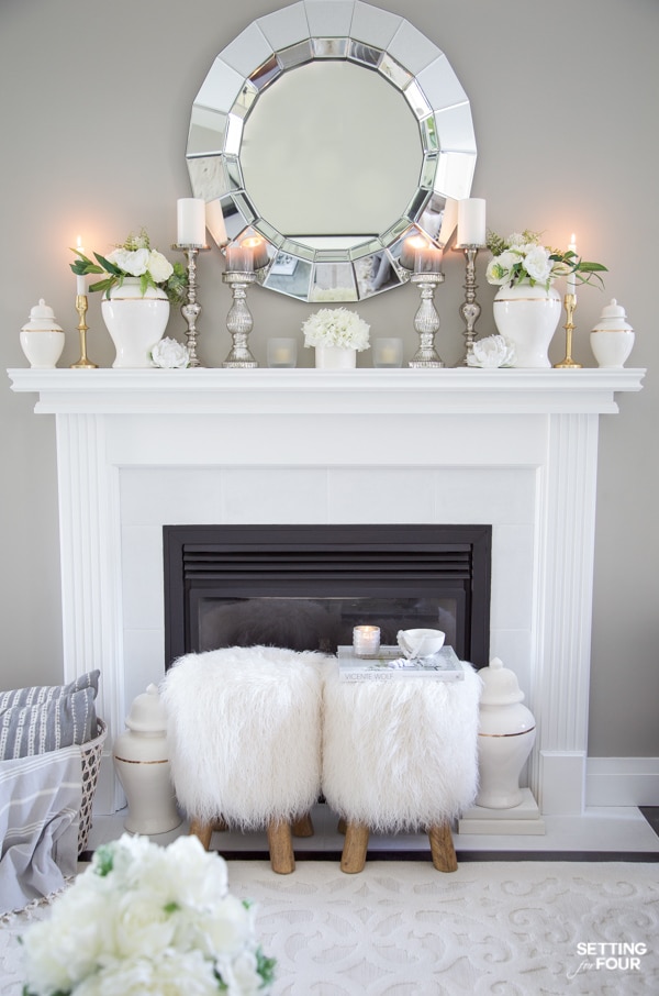 fireplace mantel decor for summer with hearth decor, ginger jars, mirror and candles.