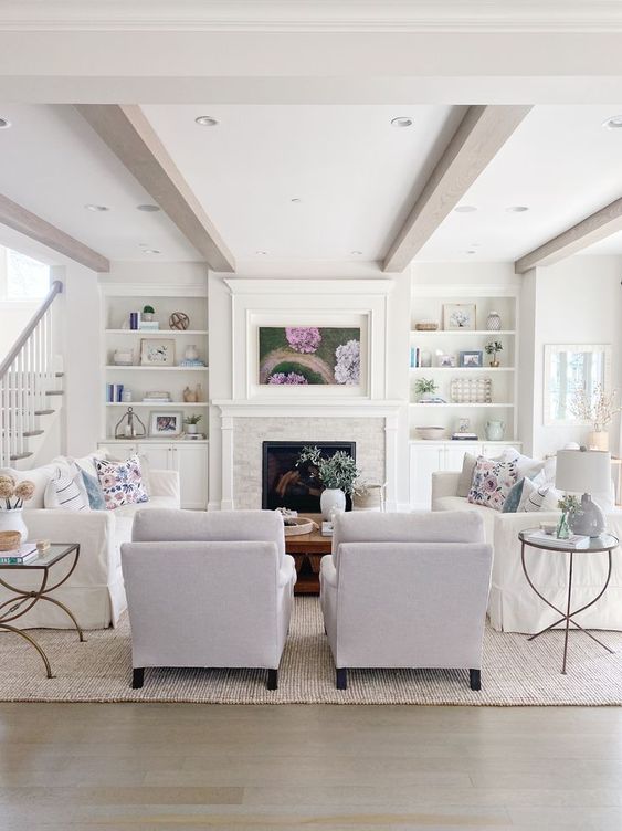 Living room furniture layout with TV and fireplace as a focal point.