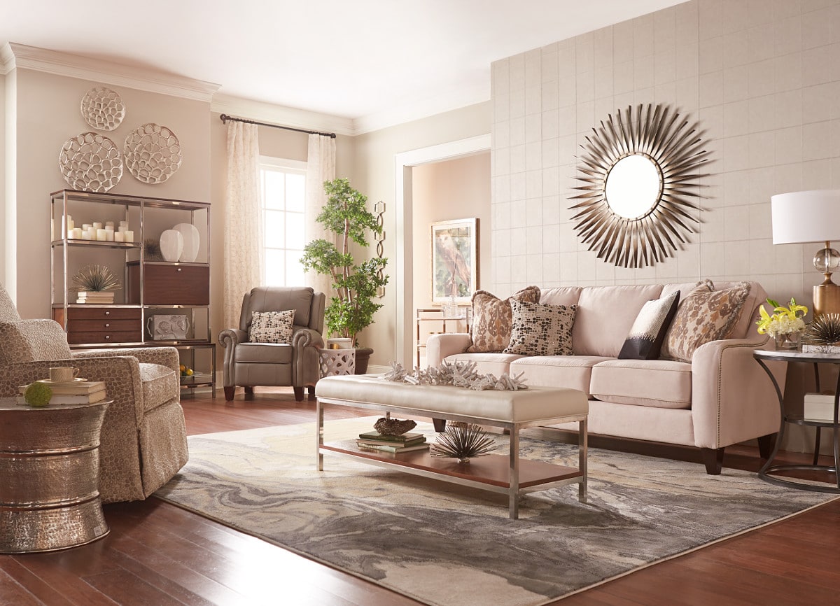 Modern glam living room with mirror above sofa. Transitional. Furniture arrangement