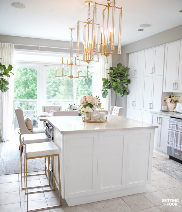 White Kitchen Decor Ideas. Kitchen island decor ideas. Kitchen Island lighting, counter stools, countertop decor ideas.