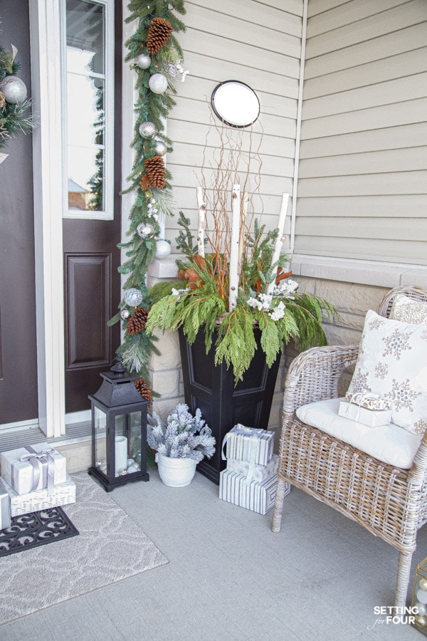 Learn how to create this festive, elegant & neutral Christmas porch decor ideas to adorn your home for the holidays!