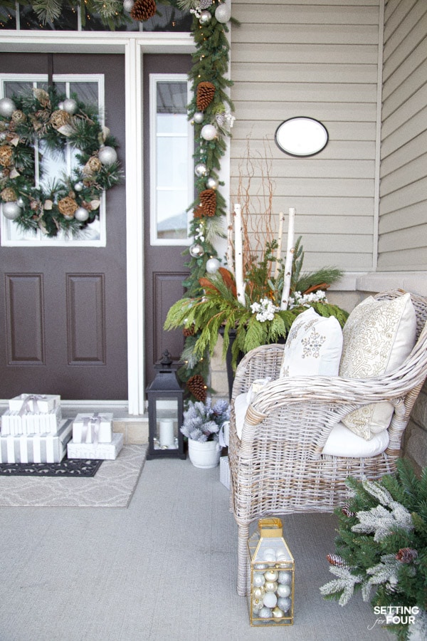 Learn how to create this festive, elegant & neutral Christmas porch decor ideas to adorn your home for the holidays!