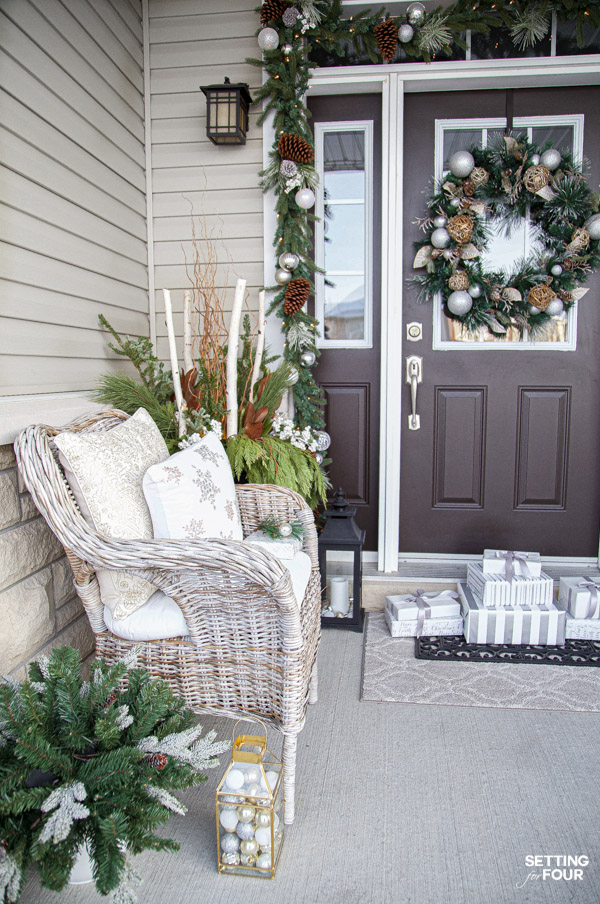 Learn how to create this festive, elegant & neutral Christmas porch decor ideas to adorn your home for the holidays!