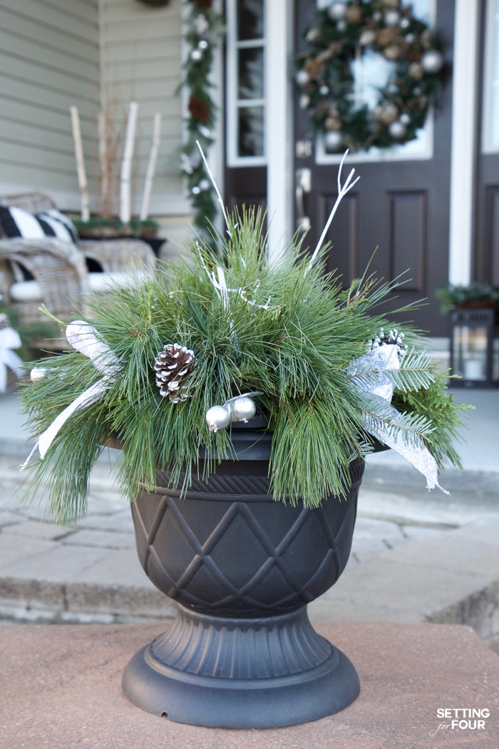 Neutral and Elegant Christmas Porch Decor Ideas! Fresh greenery Christmas planters.