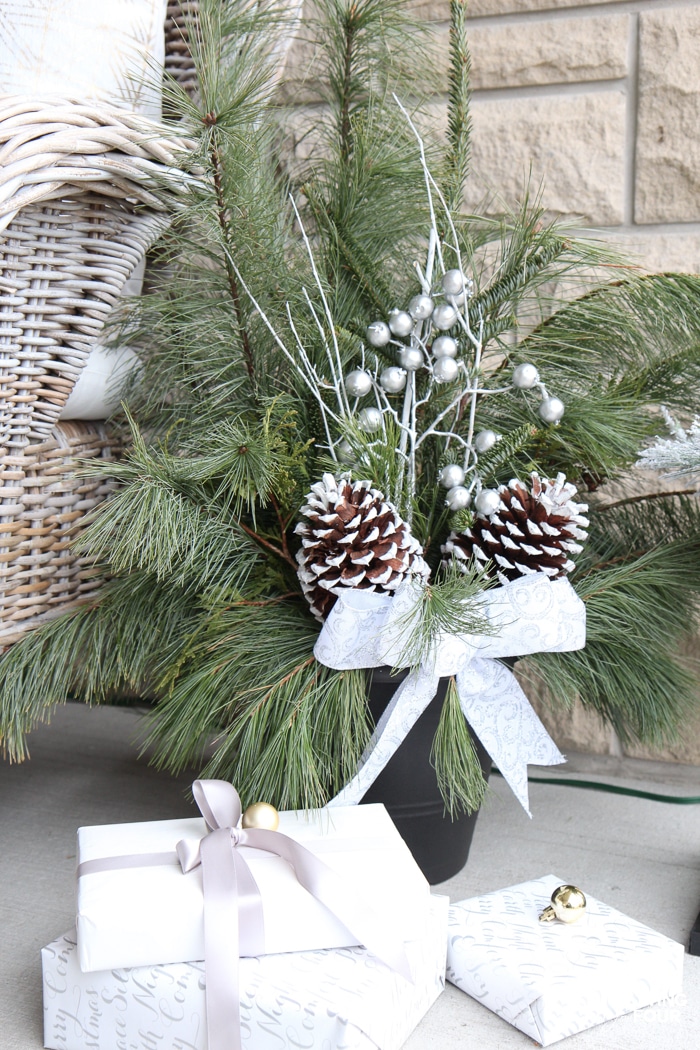 Neutral and Elegant Christmas Porch Decor Ideas! Fresh greenery Christmas planters.