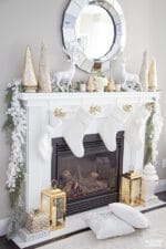 Happy Holidays! Gold and white Christmas mantel with elegant, glam decor.