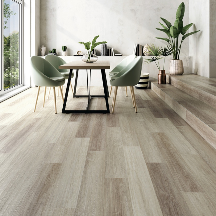 Luxury vinyl plank flooring that looks like hardwood in a dining room.