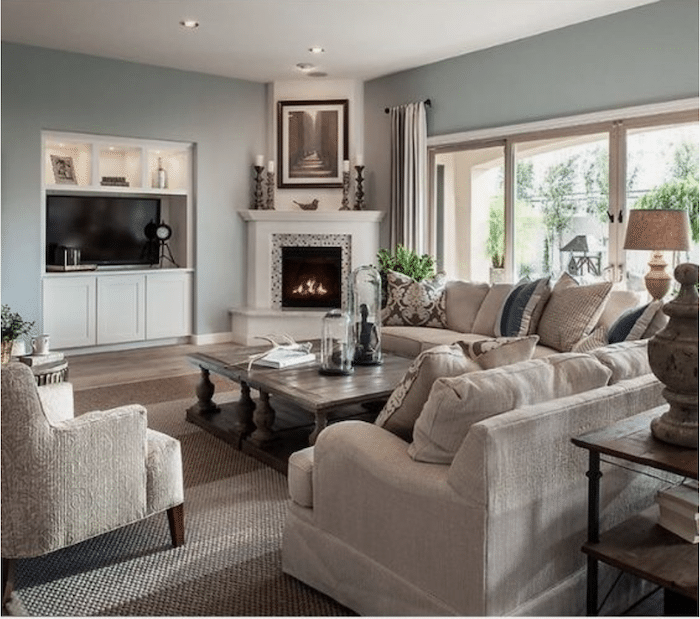 Corner Fireplace Furniture Arrangement Ideas. How To arrange living room furniture with a tv unit and a corner fireplace, 2 sofas and chairs.