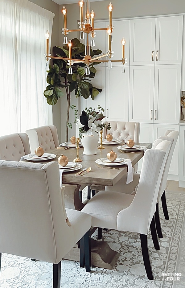 Simple, elegant Christmas dining room decor ideas, centerpiece, place settings.