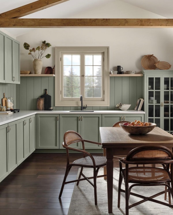 Sherwin Williams Evergreen Fog kitchen cabinet paint color idea. 