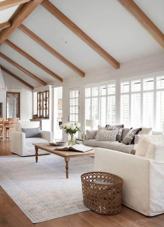 How To Arrange Furniture In A Long Living Room. furniture placement, furniture arrangement ideas, living room inspiration, cozy, elegant, modern, transitional, farmhouse, classic, wood beams, coffee table decor, Magnolia home, Joanna Gaines, white sofa, simple decor, decorating, designer tips