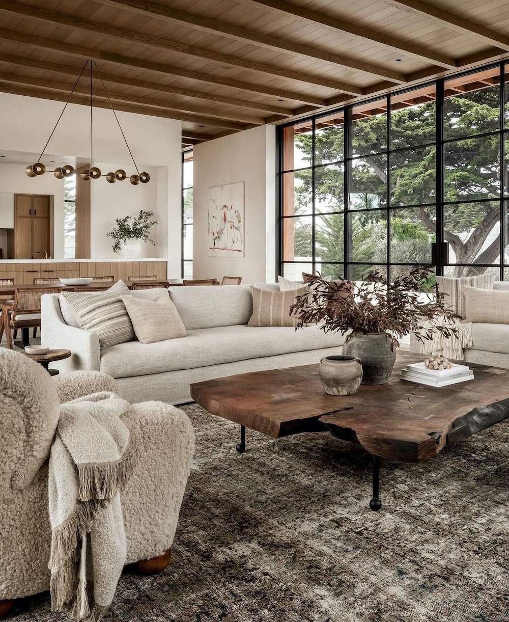 Open Concept Living Room and Great Room Furniture Layout Ideas with 2 sofas and 2 chairs, cozy, earthy, moody color scheme, neutral color palette, wood ceiling with beams, living room, dining room and kitchen furniture arrangement inspiration, new build home ideas, modern, minimalist, transitional, farmhouse interior design ideas, Designer and True Color expert design consult, online interior design services.