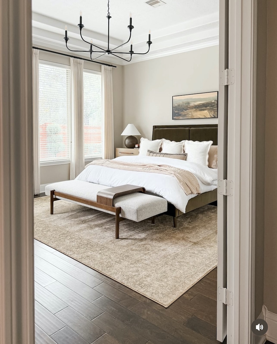 Sherwin Williams Repose Gray Bedroom Paint Color Idea, transitional primary bedroom, master, black chandelier, brown bed, dark brown floors, white tray ceiling, tiered tray ceiling, art above bed, bright, cozy, guest bedroom, hotel, luxury