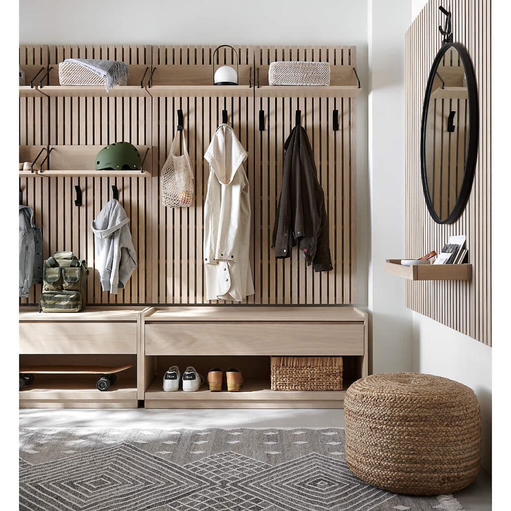 Batten White Oak Storage Bench and Panel Set with wall hooks for backpacks and coats. Small entryway and small mudroom design idea. Round mirror and shelf add elegance.