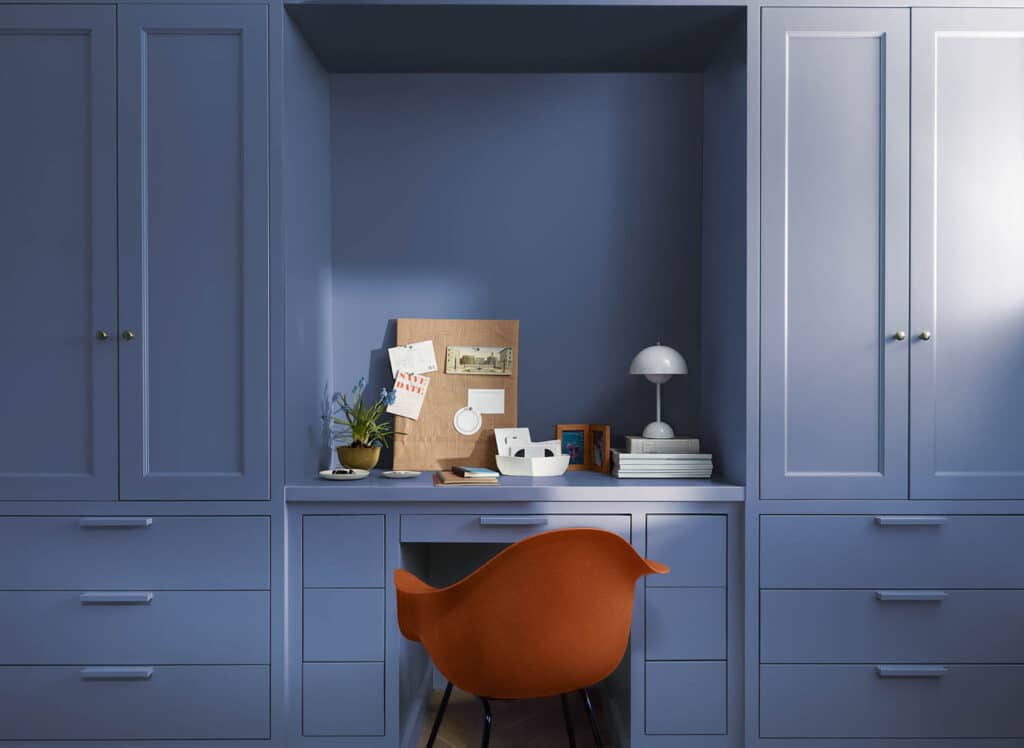 Benjamin Moore Color Of The Year 2024 -Blue Nova Cabinet Color. Builtin and wall color. Office Paint Color. Interior Design Room Photo. Designer and True Color Expert. Setting for Four Interiors.