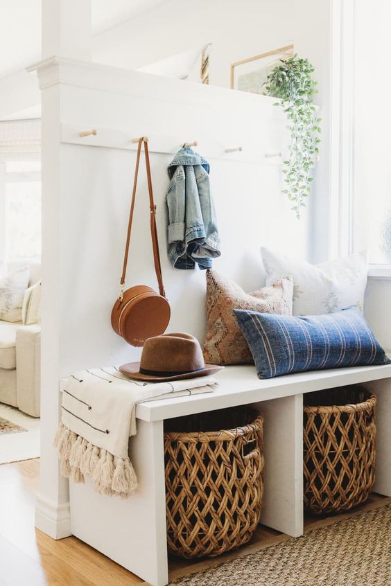 Small Entryway Storage, Decor and Organization Ideas. How To Fake An Entryway - Enter Right Into The Living Room. Design and storage ideas to create an entryway when you don't have one. 