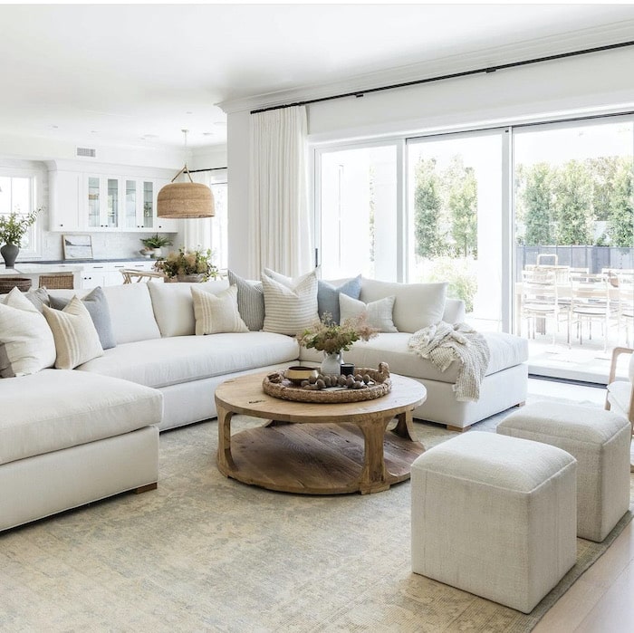 Neutral Living Room Furniture & Design Ideas
Elegant living room, neutral, airy, bright, sectional sofa, round coffee table, pouf ottomans, design and decor ideas