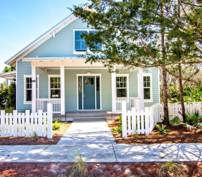 Exterior siding painted Sherwin Williams Quietude. cottage, modern farmhouse, coastal, beach house, calm, relaxing, blue and white, exterior color scheme