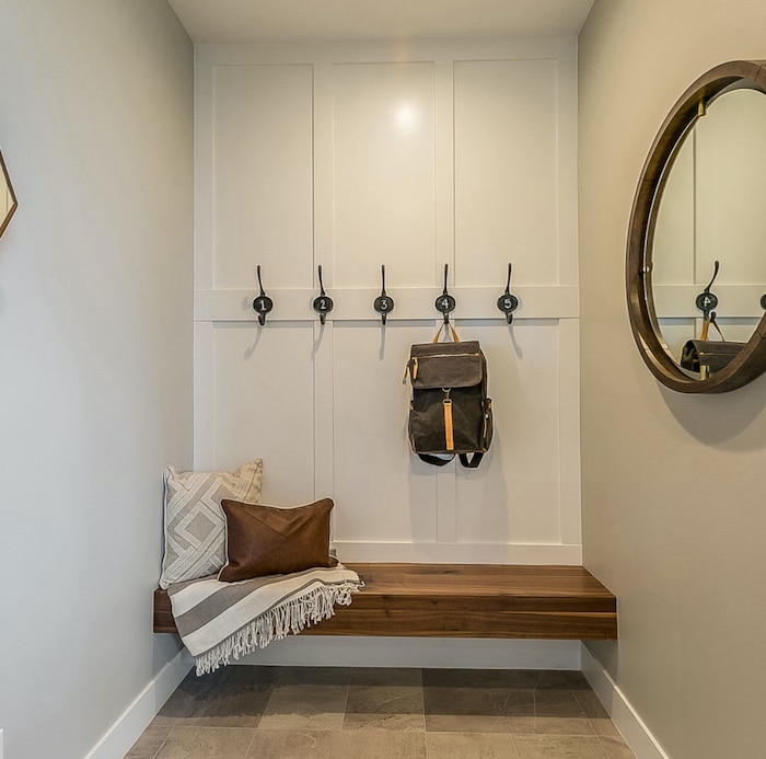 Alcove nook space backpack storage -  board and batten entryway. cozy entryway decor ideas.